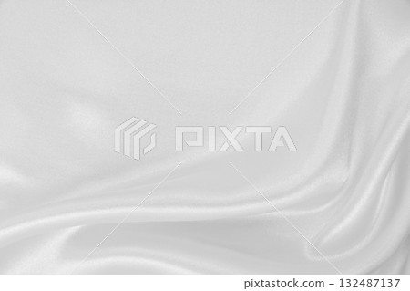 Smooth elegant white silk or satin luxury cloth texture as wedding background. Luxurious background design Smooth elegant white silk or satin luxury cloth texture as wedding background. Luxurious background design 132487137