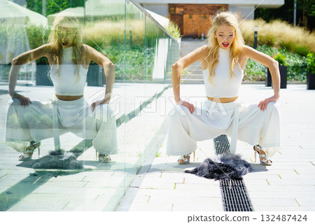 Woman wearing crop top and culottes 132487424