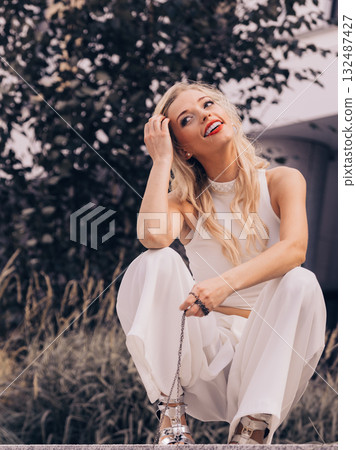 Woman wearing crop top and culottes 132487427