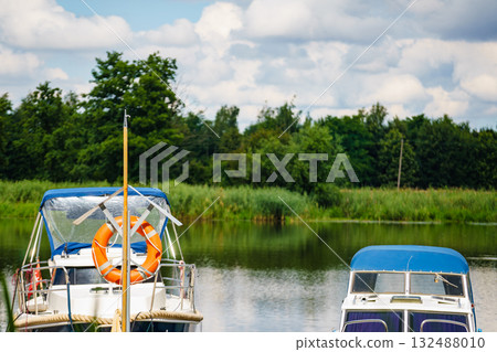 Rescue red lifebuoy life ring in port 132488010