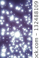 Abstract glowing white light particles floating in cosmic starfield 132488109