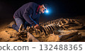 Paleontologist working on dinosaur fossil discovery at night 132488365