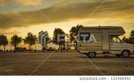 Camper car on beach at evening Camper car on beach at evening 132488492
