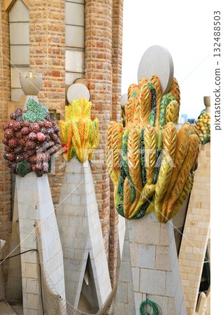 Fruit sculpture symbolizing the birth of Christ, displayed atop the Sagrada Familia's Nativity facade Fruit sculpture symbolizing the birth of Christ, displayed atop the Sagrada Familia's Nativity facade 132488503