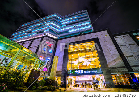 Tokyo cityscape in Japan. View of Otsuka Station at night. Many people coming and going. 132488780