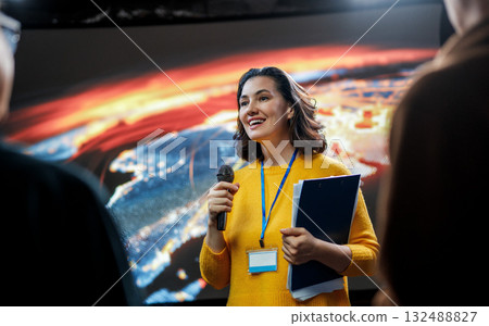 woman is giving a presentation at conference woman is giving a presentation at conference 132488827