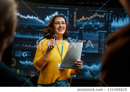 woman is giving a presentation at conference woman is giving a presentation at conference 132488828