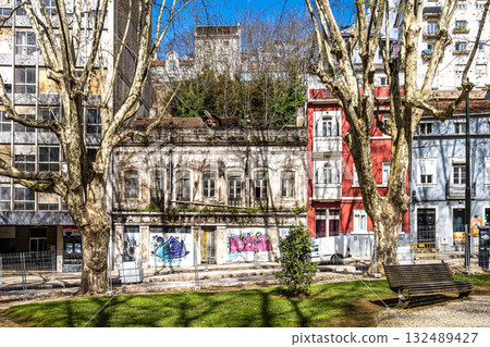Walking along the streets in historic Coimbra, Portugal's most important university town and old capital. Baixa streets in medieval quarter. Walking along the streets in historic Coimbra, Portugal's most important university town and old capital. Baixa streets in medieval quarter. 132489427