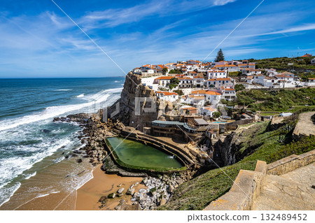 View from the cliffside walking trail of the scenic seaside town of Azenhas do Mar, Portugal View from the cliffside walking trail of the scenic seaside town of Azenhas do Mar, Portugal 132489452