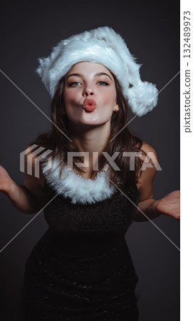 Joyful holiday fun with a festive hat! Joyful holiday fun with a festive hat! 132489973