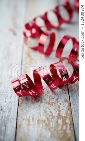 Red ribbon spirals with craft letters Red ribbon spirals with craft letters 132489974