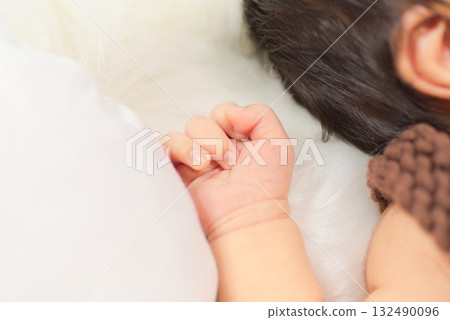The comfort and hope for the future that a newborn's tiny hands hold The comfort and hope for the future that a newborn's tiny hands hold 132490096
