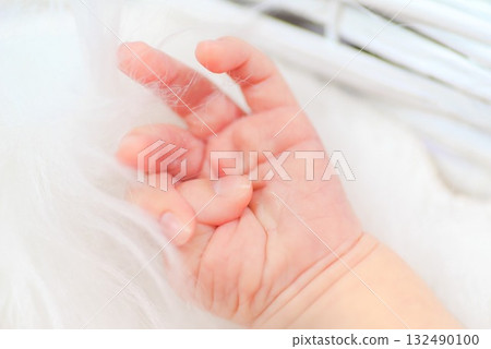 The comfort and hope for the future that a newborn's tiny hands hold The comfort and hope for the future that a newborn's tiny hands hold 132490100