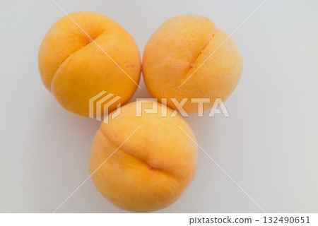 Macro photography of a fresh yellow peach Macro photography of a fresh yellow peach 132490651
