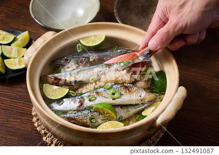 Sanma rice cooked in a clay pot Sanma rice cooked in a clay pot 132491087
