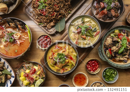many different thai food dishes on table in modern restaurant in bangkok thailand many different thai food dishes on table in modern restaurant in bangkok thailand 132491151