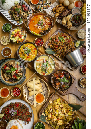 many different thai food dishes on table in modern restaurant in bangkok thailand 132491157