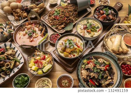 many different thai food dishes on table in modern restaurant in bangkok thailand many different thai food dishes on table in modern restaurant in bangkok thailand 132491159