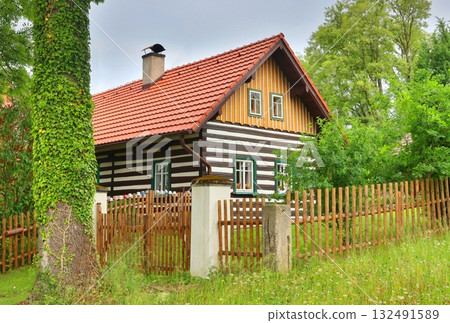 Traditional wooden cottage in village Traditional wooden cottage in village 132491589