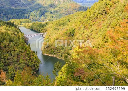 The first Tadami River Bridge at its best when the autumn leaves are in full bloom The first Tadami River Bridge at its best when the autumn leaves are in full bloom 132492399