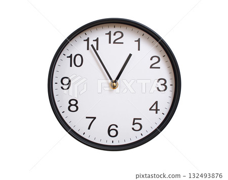 Round wall clock showing 00:55 or 12:55 isolated on white background. Concept of time, punctuality, deadline, or beginning of a new day. 132493876