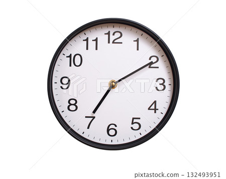 Round wall clock showing 07:10 or 19:10 isolated on white background. Concept of time, punctuality, deadline, or beginning of a new day. 132493951