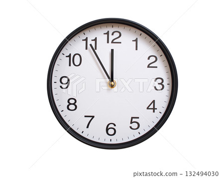 Round wall clock showing 11:55 or 23:55 isolated on white background. Concept of time, punctuality, deadline, or beginning of a new day. 132494030