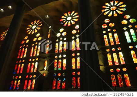 Warm stained glass on the Passion facade of the Sagrada Familia 132494521