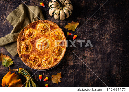 Halloween apple pie with scary faces Halloween apple pie with scary faces 132495372