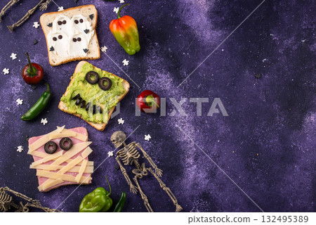 Halloween food for children, monsters toasts 132495389