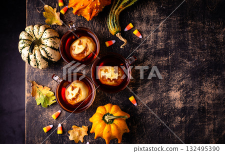Haloween spicy apple cider drink Haloween spicy apple cider drink 132495390