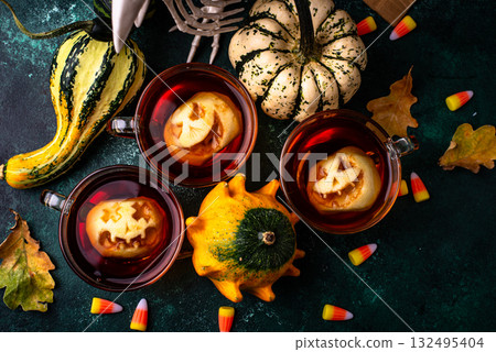Haloween spicy apple cider drink Haloween spicy apple cider drink 132495404