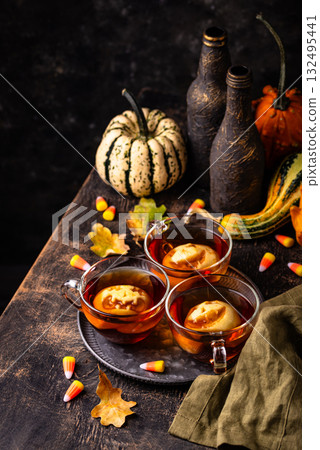 Haloween spicy apple cider drink Haloween spicy apple cider drink 132495441
