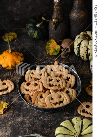 Halloween cookies in shape of jack-o-lantern Halloween cookies in shape of jack-o-lantern 132495455