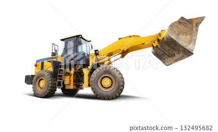 Heavy machinery lifting earth in isolated outdoor setting under clear sky 132495682