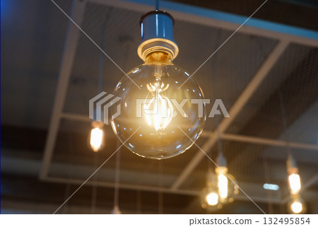 Close-up light bulb electricity symbol for new idea innovation invention. Close-up light bulb electricity symbol for new idea innovation invention. 132495854