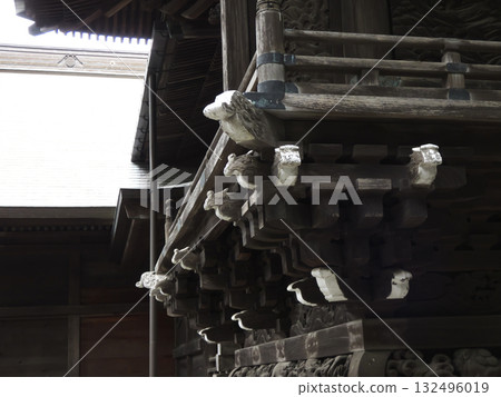 The wooden framework and intricate carvings decorating the shrine building of Mitake Shrine The wooden framework and intricate carvings decorating the shrine building of Mitake Shrine 132496019