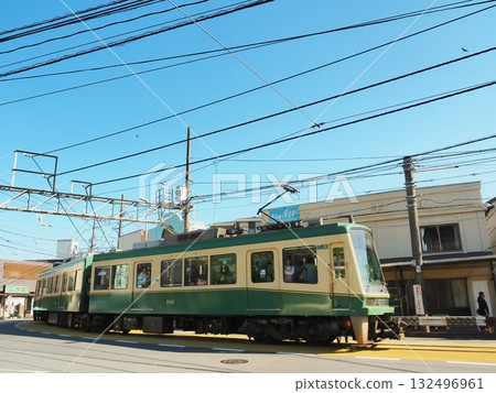 Kanagawa Prefecture, Enoshima Electric Railway running under a blue sky, October 132496961