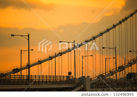 A bridge shining in the setting sun 132496995