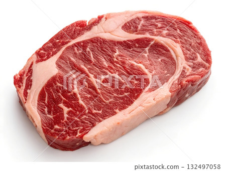 A raw marbled ribeye steak with visible fat marbling isolated on a white background 132497058