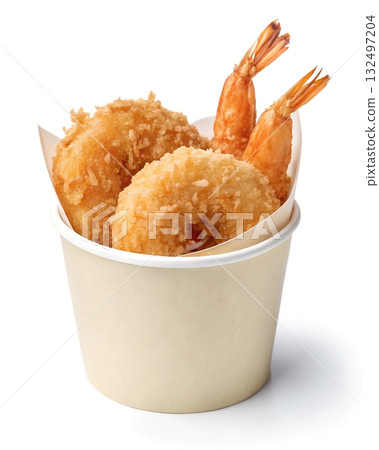 Crispy deep fried shrimp with tails visible served in a pale beige paper cup 132497204