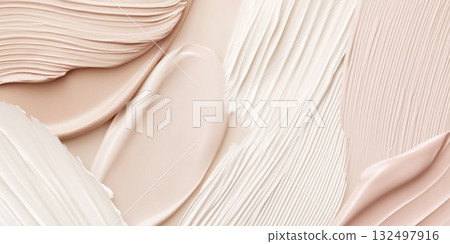 Fluid cosmetics textures featuring spread highlighter and foundation cream 132497916
