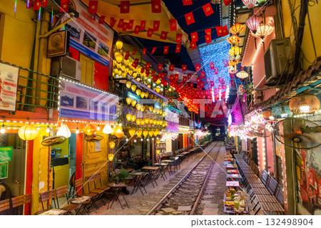 Lively Hanoi Train Street Cafes at Night Lively Hanoi Train Street Cafes at Night 132498904