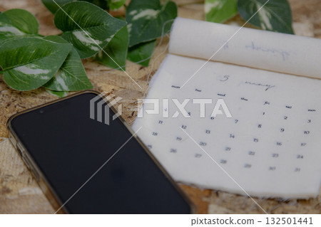 May 2026 calendar material: Fabric calendar and wood grain background May 2026 calendar material: Fabric calendar and wood grain background 132501441