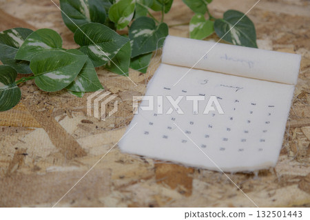 May 2026 calendar material: Fabric calendar and wood grain background May 2026 calendar material: Fabric calendar and wood grain background 132501443