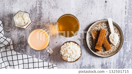 Protein nutrition and green tea for skin microbiome care set top view web banner Protein nutrition and green tea for skin microbiome care set top view web banner 132501715