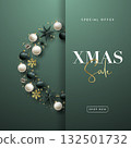 Elegant wreath design featuring festive ornaments and calligraph 132501732