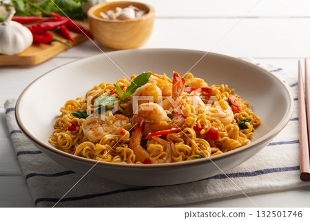 Stir fried instant noodles and shrimp with basil leaves.Thai food.(pad ka prao) 132501746