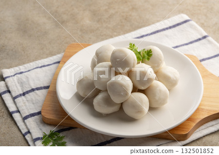 Uncooked Thai Pork meatballs on white plate. 132501852