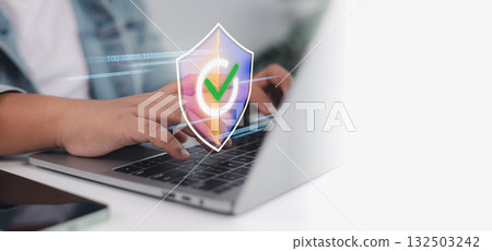 Cybersecurity and data protection user typing on laptop with digital shield and secure network icon Cybersecurity and data protection user typing on laptop with digital shield and secure network icon 132503242